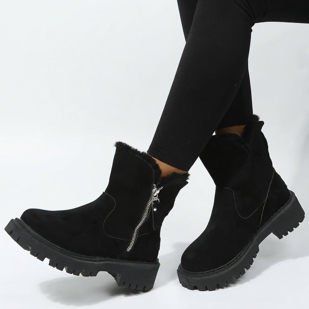 Bottines en fausse fourrure, fermeture latérale, semelle crantée